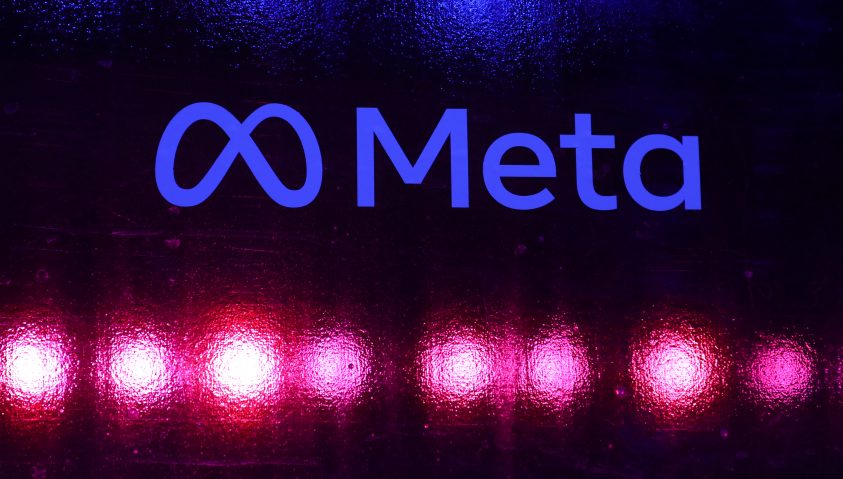 Logo von Meta und darunter punkte Neonstrahlen